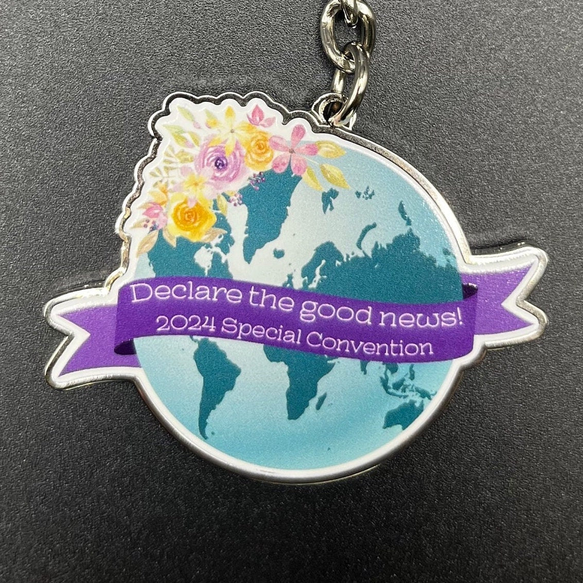 Declare the Good News 2024 Special Convention Floral Globe Keychain and Lapel Pin